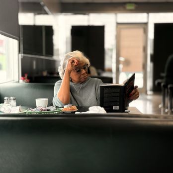 Guest reading at Tak's Coffee Shop